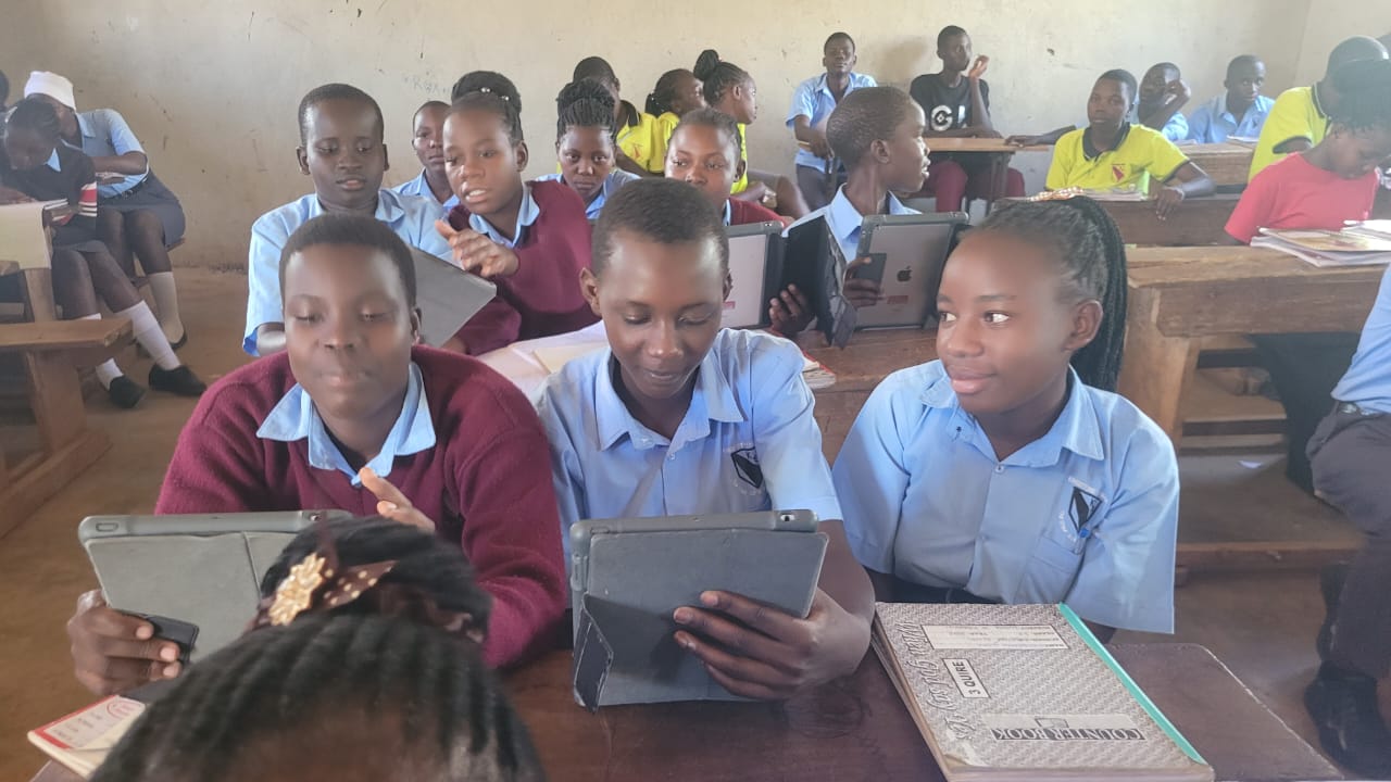 Students at Kingstone Secondary School in Uganda working on iPads donated by Sandylands Primary School in Morecambe